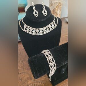 Necklace, bracelet and earrings.
